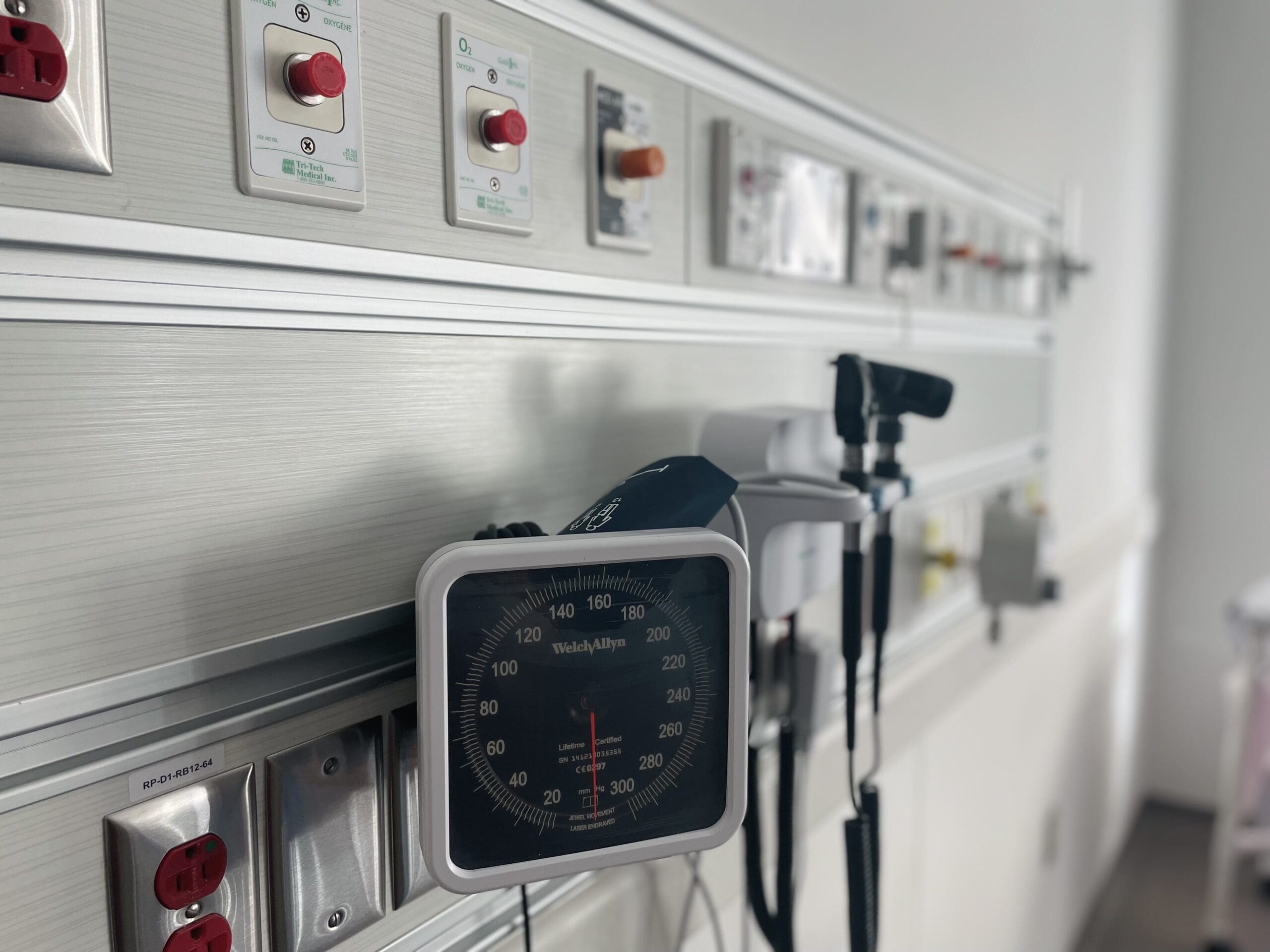 Wall mounted instruments found above a hospital bed.